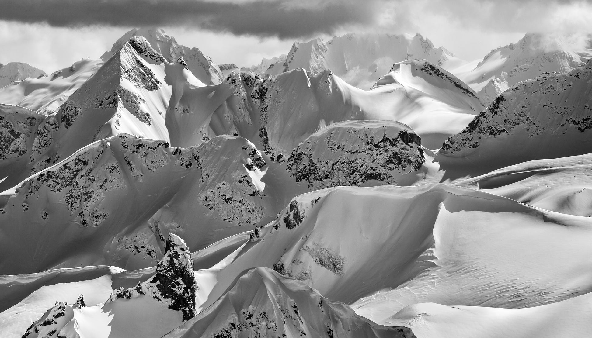 Fine art print of mountain ridges in Whistler Blackcomb backcountry by Jussi Grznar - winter landscape